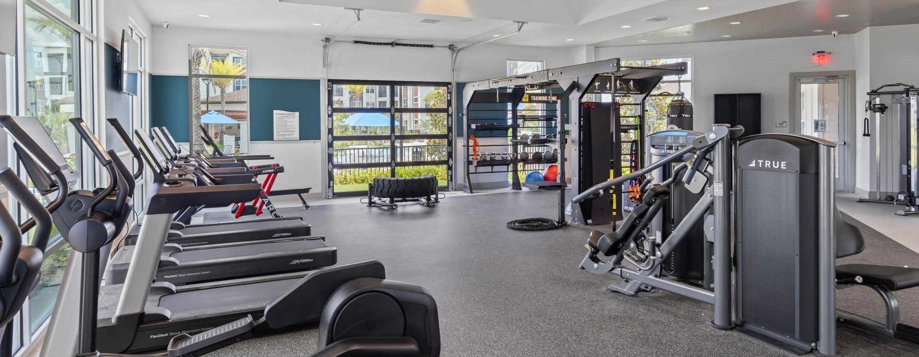 a gym with treadmills